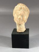 Small terracotta bust of a woman on plinth, possibly Greek, approx 11cm in height incl. plinth,