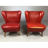 Pair of vintage / retro red upholstered low occasional chairs, with studded backs and tapering