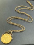 Gold Sovereign dated 1915 on a 9ct Gold fine link chain (total weight 12.5g)