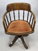 Oak Captain's chair with read leather seat, on swivel base