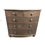 Bow fronted chest of five drawers on turned feet