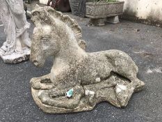 Garden statue of a recumbent foal