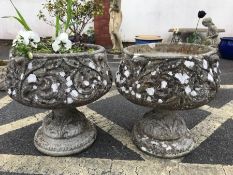 Pair of concrete ornamental planters, each approx 48cm in height