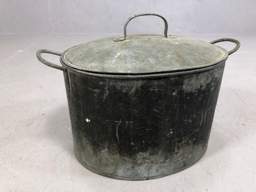 Large vintage galvanised twin handled pot with lid, approx 33cm tall