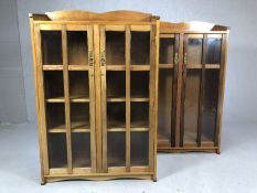 Pair of glass-fronted bookshelves / cabinets, each approx 81cm x 26cm x 118cm tall