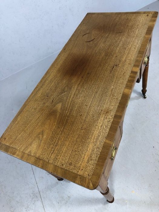 Antique kneehole writing desk on turned legs with original castors, five drawers and brass - Image 5 of 6