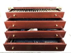 Canteen of silver plated cutlery, twelve place settings, in wooden case of four drawers with brass