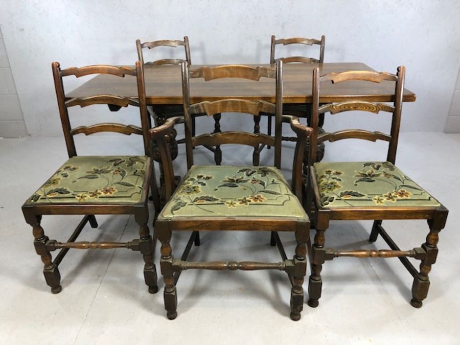 Oak dining table with heavily carved baluster legs and cross stretcher, with one carver and four - Image 2 of 5