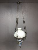 French 'rise and fall' hanging oil lamp with glass shade and chimney, ceramic base with floral