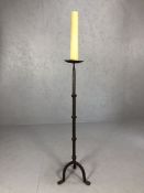 Iron floor standing medieval style candle holder, approx 118cm in height