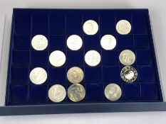 Collection of fourteen commemorative and collectable coins in presentation case