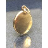 14k Gold Locket approx 17mm tall and 3.4g