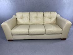 Contemporary cream leather three-seater sofa, approx 200cm in length