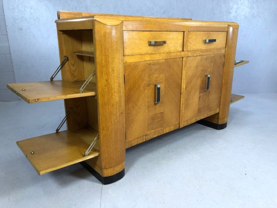 Pine Art Deco style sideboard and drinks cabinet with dropdown cupboards to either end, two drawers, - Image 5 of 7