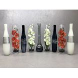 Modern Interiors: Collection of nine tall decorative glass vases, in varying designs, the tallest