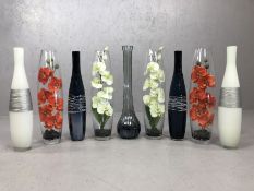 Modern Interiors: Collection of nine tall decorative glass vases, in varying designs, the tallest