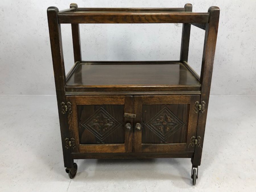 Wooden carved wine rack and an oak drinks trolley with cupboard under - Image 2 of 7