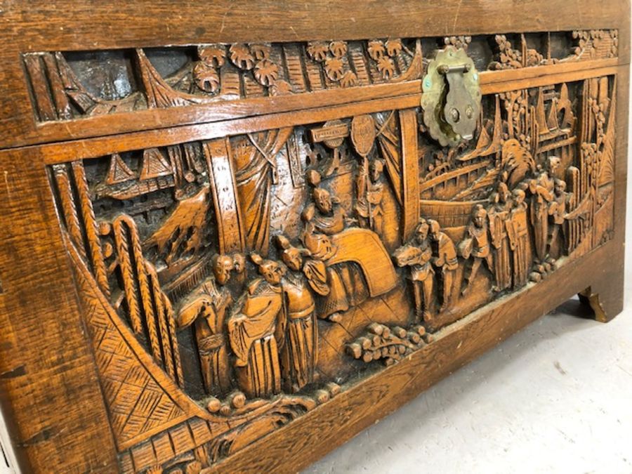 Heavily carved Chinese camphor wood chest with two internal trays, approx 103cm x 52cm x 60cm - Image 8 of 8