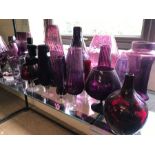 Large collection of modern purple coloured glassware, circa 33 pieces