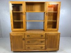 Ercol sideboard with Ercol glazed units above and Ercol shelf and display unit to centre, approx