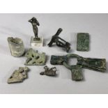 Collection of artefacts, mostly appearing to be Roman, to include bronze gladiator brooch, lead