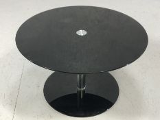 Modern black glass and chrome circular coffee table, approx 65cmin diameter x 39cm tall