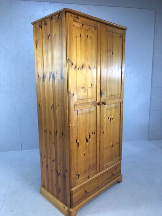Pine single two door wardrobe with hanging rail and cupboard under, approx 86cm x 52cm x 179cm - Image 4 of 4