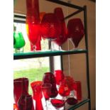 Large collection of modern red coloured glassware, circa 35 pieces