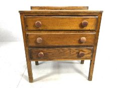 Small chest of three drawers with turned handles, approx 72cm x 39cm x 79cm tall