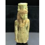Fragment of a stone Egyptian figure, possibly Nefertum, approx 7.5cm in height, with green