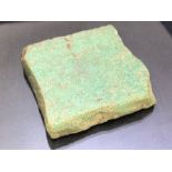 Fragmentary turquoise / green glass tile or inlay, possibly Roman, approx 7cm square