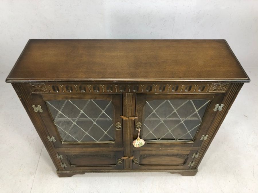 Oak carved sideboard with glazed and leaded doors and cupboard under - Image 2 of 4