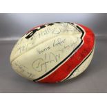 Autographs: A rugby ball signed by many famous people including JPR Williams, Alex Higgins, Surge