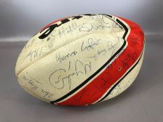 Autographs: A rugby ball signed by many famous people including JPR Williams, Alex Higgins, Surge