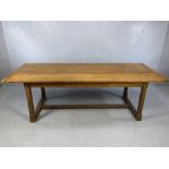 Refectory table of three blank design with pegged breadboard ends, octagonal carved legs and cross