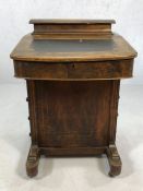 Antique Davenport writing desk with inlay leather top and a flight of four drawers to right hand