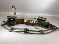 Vintage Tin Plate clockwork train set comprising small amount track Locomotive, Wagon, signal etc