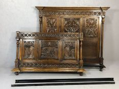 Ornately carved wooden Breton marriage bed, base frame approx 139cm wide x 195cm in length