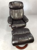 Brown leather recliner swivel chair with matching foot stool