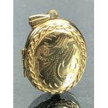 9ct Gold Locket approx 27mm tall and 3.6g
