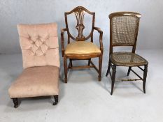Collection of three chairs; one low button back bedroom chair, one shield-back and one cane seated
