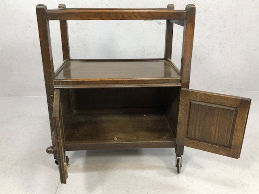 Wooden carved wine rack and an oak drinks trolley with cupboard under - Image 3 of 7