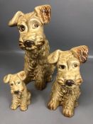 Trio of graduated Sylvac dogs / puppies, all stamped to the base, the tallest approx 28cm in height