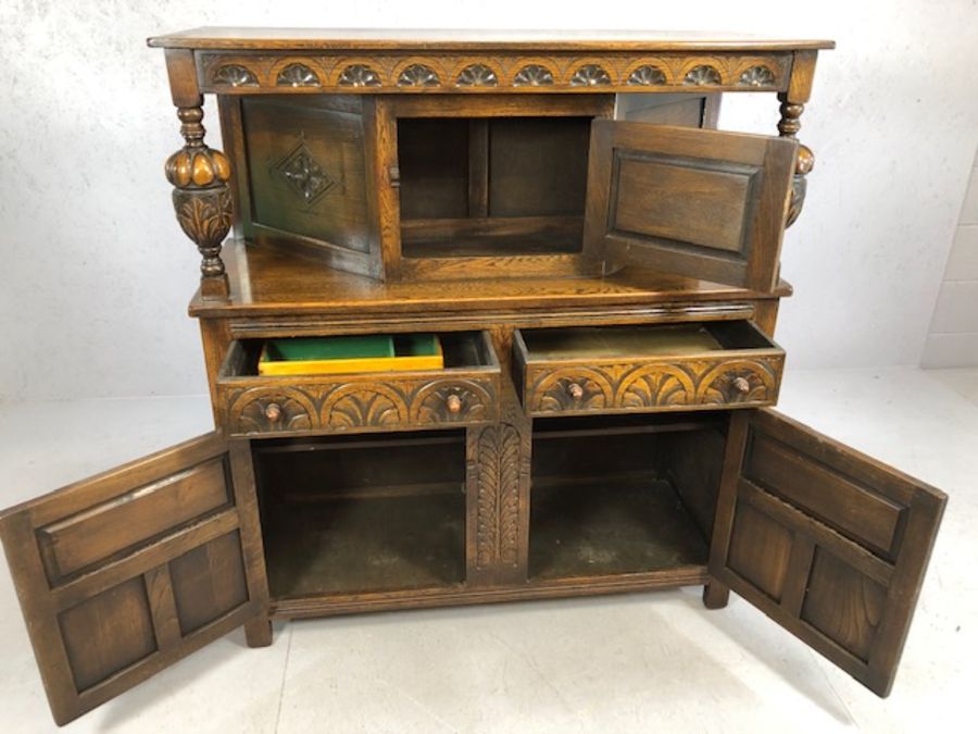 Carved oak buffet with baluster columns, carved detailing, cupboards and drawers, approx 122cm x - Image 3 of 5