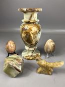 Collection of five onyx decorative items to include a vase approx 20cm in height, two eggs, an