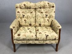 Two seater wooden framed cottage style sofa