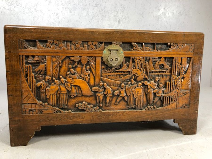 Heavily carved Chinese camphor wood chest with two internal trays, approx 103cm x 52cm x 60cm - Image 3 of 8