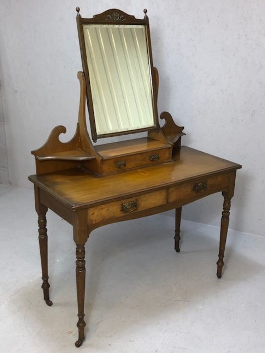 Victorian dressing table marked Maple & Co, with mirror over, two drawers, turned legs, on