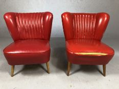Pair of vintage / retro red upholstered low occasional chairs, with studded backs and tapering