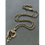 9ct Gold chain (8.5g) with unmarked gold coloured heart shaped pendant set with seed pearls (3.5g)
